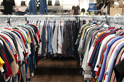 Racks of clothes inside boutique