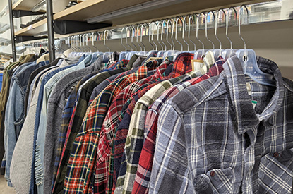 Racks of clothes inside boutique