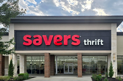 Savers shopping cart in the book aisle.