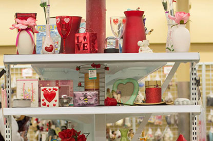 Valentine's themed items on a shelf.