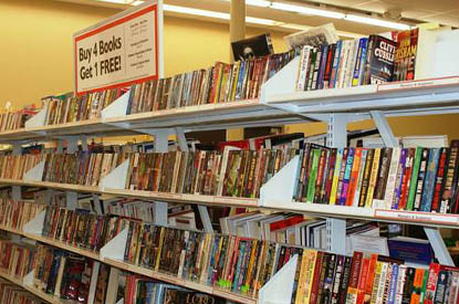 Shelves filled with miscellaneous books.