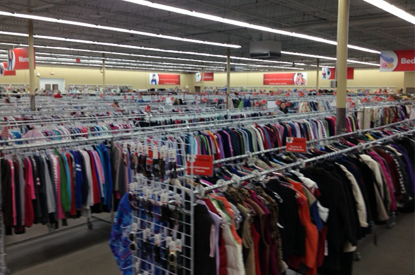 Racks of all types of clothes.