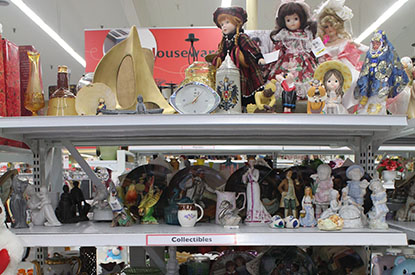 Shelves of figurines in the housewares department.