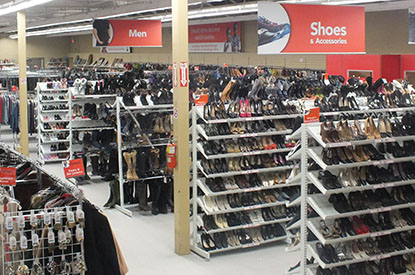 Shelves of shoes in the shoe department.