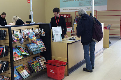 Customer puchasing items at the register.