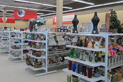 Vases on a shelf in the housewares department.
