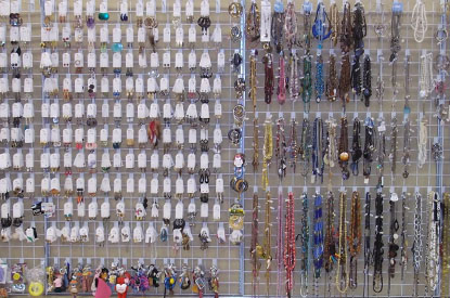 Racks of costume jewelry and accessories.