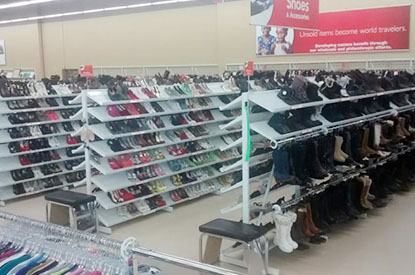 Rows of shoes and boots.