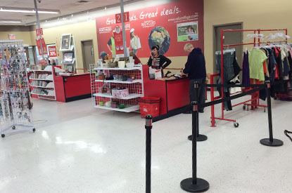 Customer purchasing items at the register.