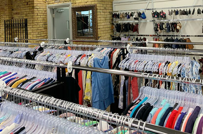 Racks of all types of clothes.